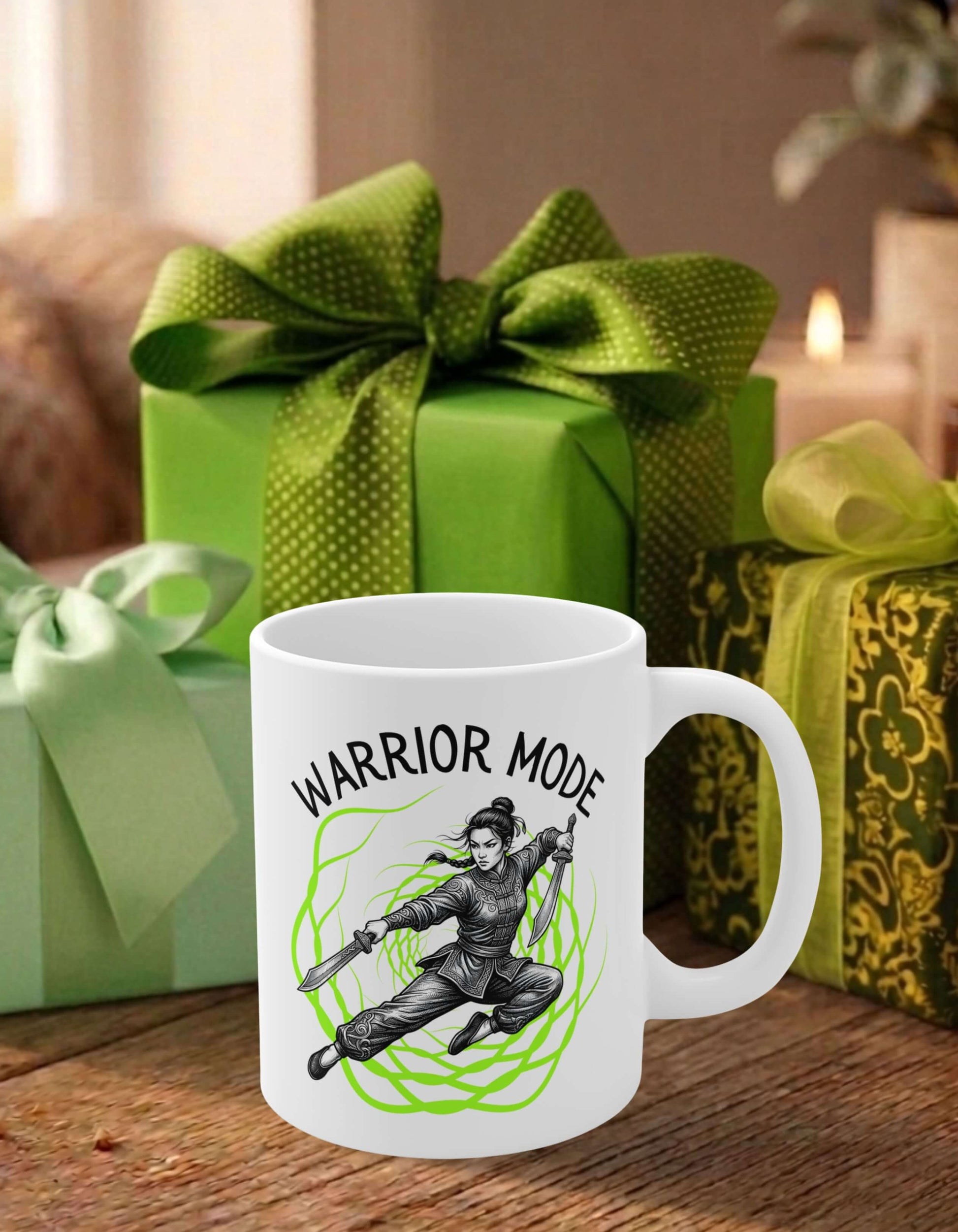 A white 11 oz ceramic mug featuring the slogan — Warrior Mode printed in black letters, above the graphic of a female warrior mid-air wielding twin swords, surrounded by a crackling neon green energy field; sits on a wooden table, in front of some thoughtfully wrapped gifts.